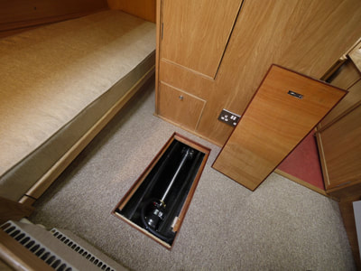 Easy access to services. Carpeted hatch reveals prop shaft, bearings and seals and one of the 3 bilge pumps. Huffler 35 / 40 
